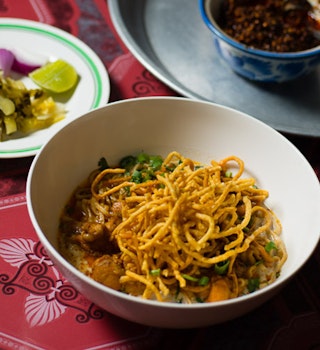 A bowl of chicken kow soy, Khao Soi Prince, Chiang Mai. Image by Austin Bush