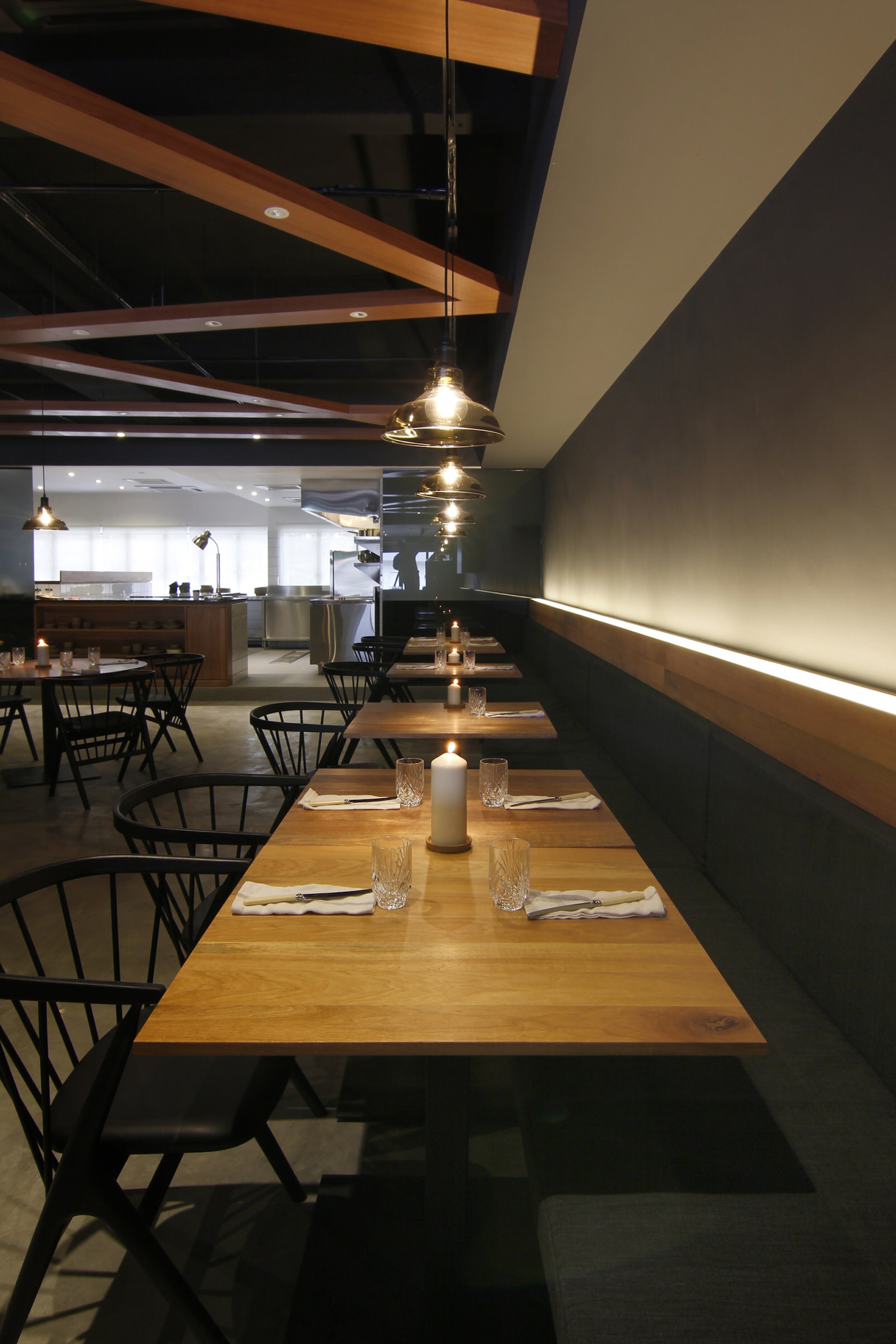 A row of restaurant tables with ambient lighting in Sitka, Damansara Heights, Kuala Lumpur © Image courtesy of Sitka / Studio