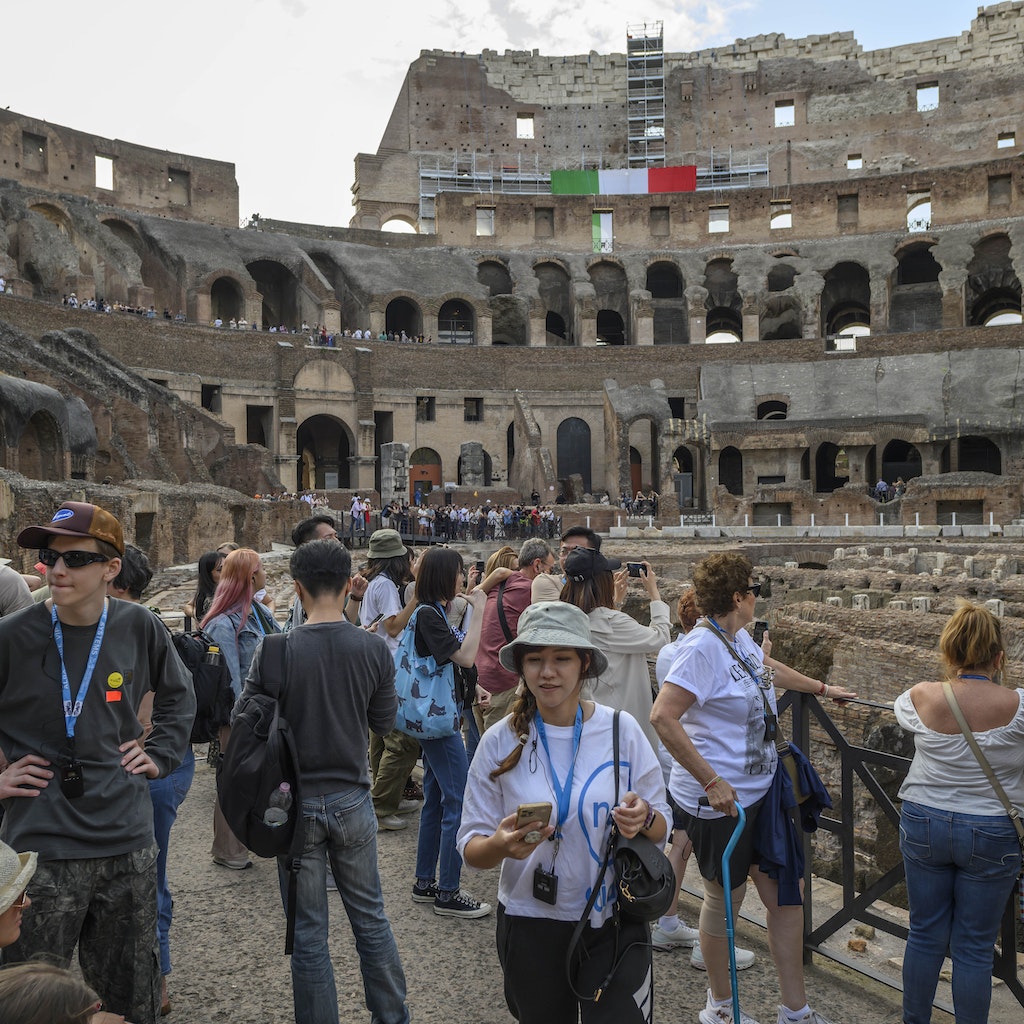 ROME, ITALY - MAY 30: Tourists visit the Colosseum before the Orchestra Italiana del Cinema performs during the new Colosseum route inauguration on May 30, 2023 in Rome, Italy. (Photo by Antonio Masiello/Getty Images)
1258296327
colosseo, italian cinema orchestra