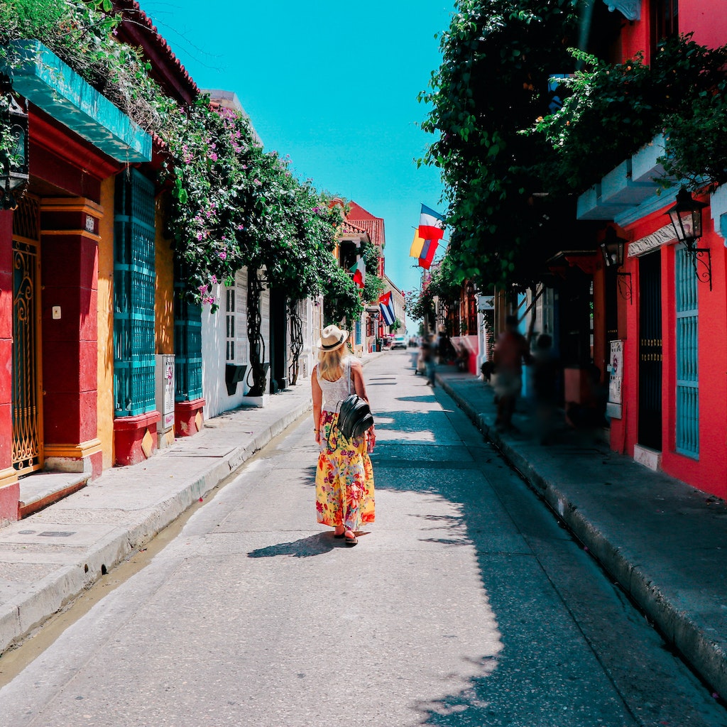 Young woman walking on a colorful street in old city of Cartagena, Colombia
1408955173