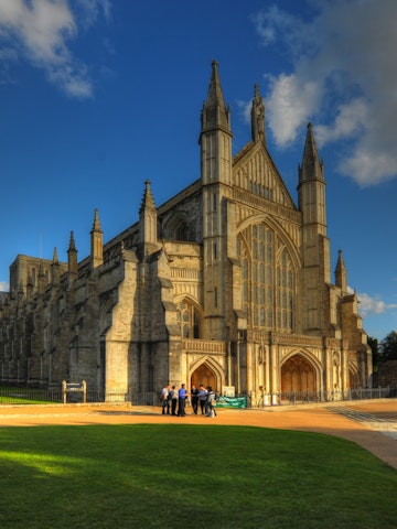 Sun shining on the exterior of Winchester Cathedral.