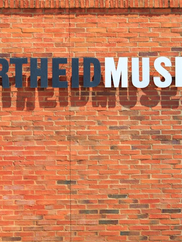 JOHANNESBURG, AUGUST 21: Apartheid Museum sign on August 21, 2014 in Johannesburg. The Apartheid Museum is dedicated to illustrating apartheid and the 20th century history of South Africa; Shutterstock ID 219540106; Your name (First / Last): Josh Vogel; Project no. or GL code: 56530; Network activity no. or Cost Centre: Online-Design; Product or Project: 65050/7529/Josh Vogel/LP.com Destination Galleries
